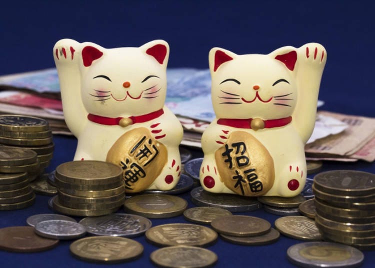 注意观察招财猫的动作！