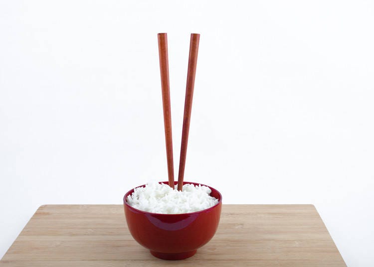 4. Don’t Stick Your Chopsticks into Rice