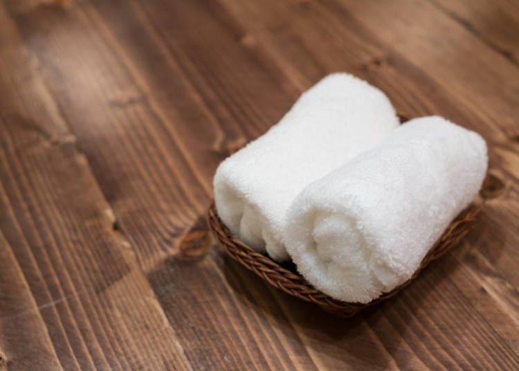 4. Being offered water and a hot towel