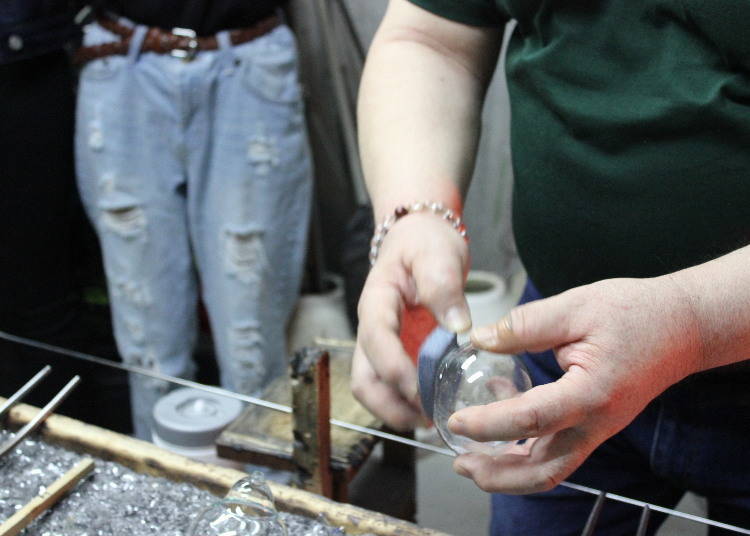 Roughening the edge of the glass makes for a soft sound.