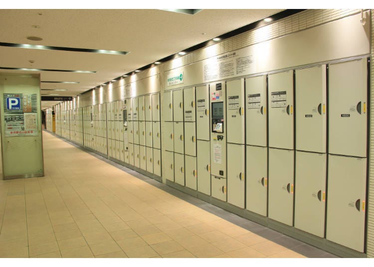 The West Exit Underground Plaza at Shinjuku Station: coin lockers near the entrance of a parking lot.