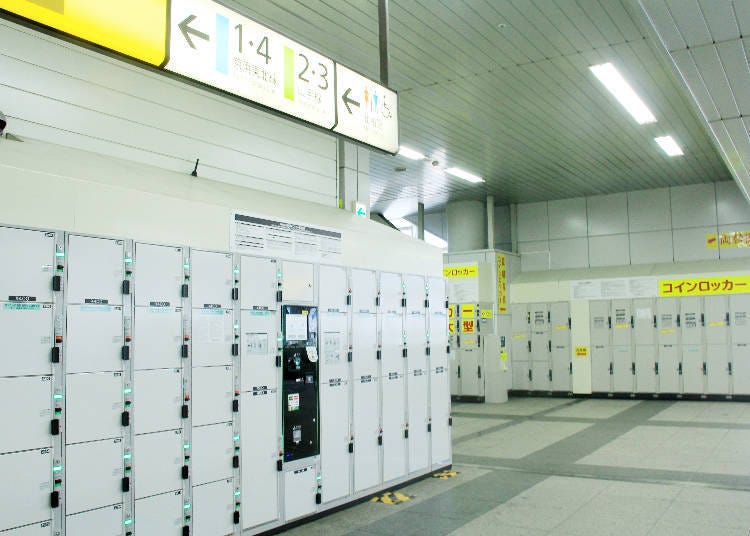 Coin lockers in a wide connecting passage.