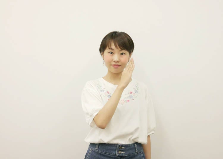 Waving Your Hand in Front of Your Face to Say &ldquo;No&rdquo;