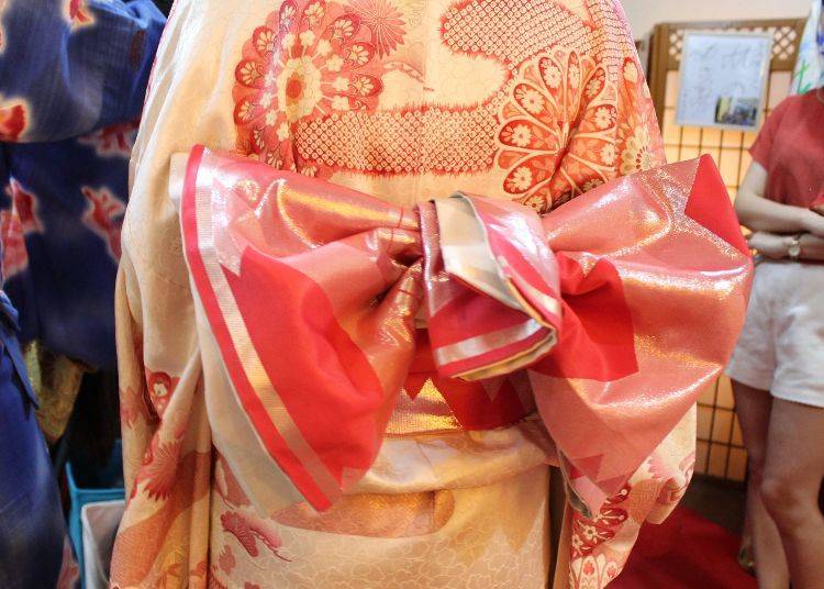 A pink obi on a pink kimono for a cute look.