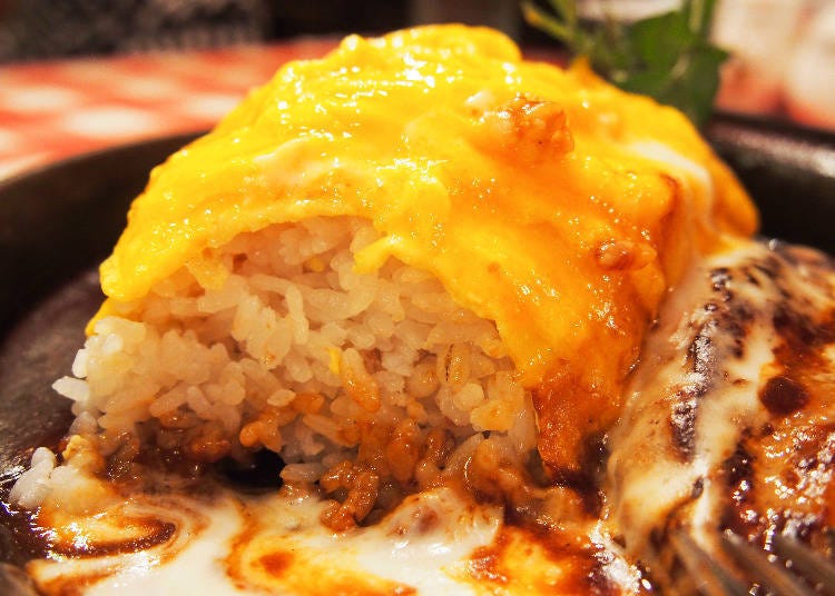 The fluffy omelet hides a delicious serving of multigrain rice!