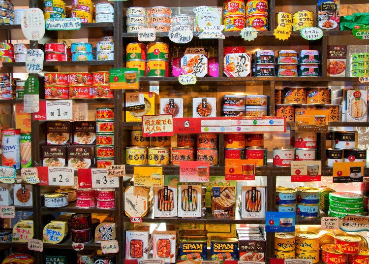 The moment you set foot in the place you are greeted by a wall crammed full of cans