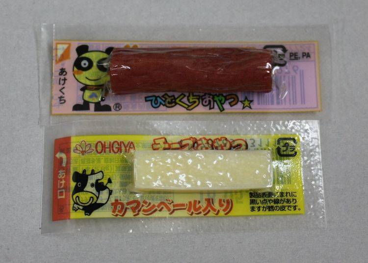 Top: a one-bite salami snack called Oyatsu Calpas / Bottom: Cheese Oyatsu with Camembert. The cute packaging makes these savory snacks cute souvenirs. (10 yen for one)