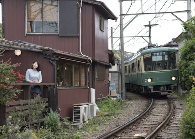 Sitting in the terrace, watching the trains whizzing past!