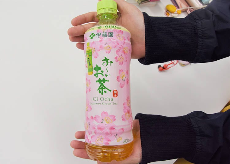 A drink she got from a convenience store. The bottle boasts a cute spring design.