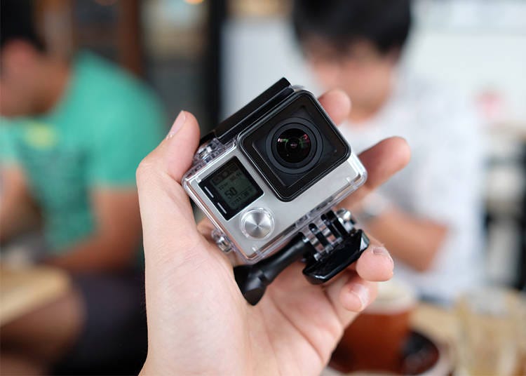 The palm-sized GoPro camera.
