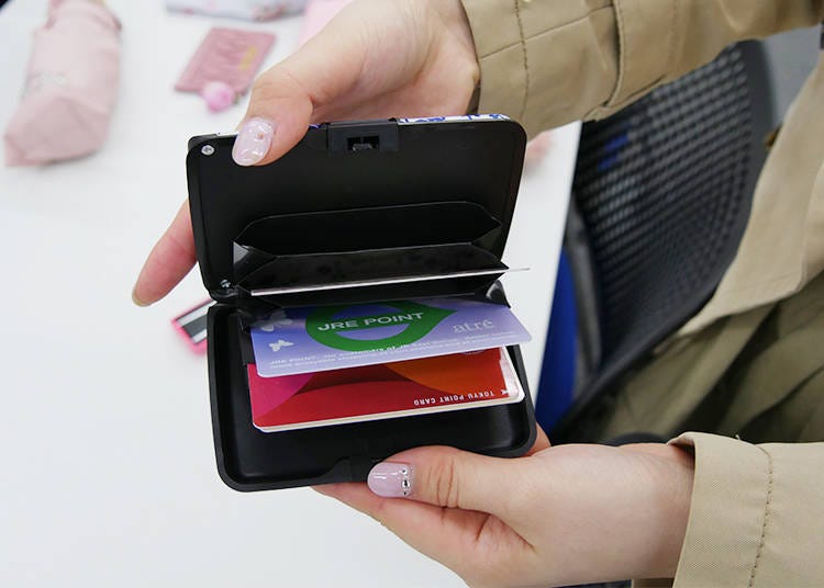 Her card case houses the cards that don’t fit in her wallet.