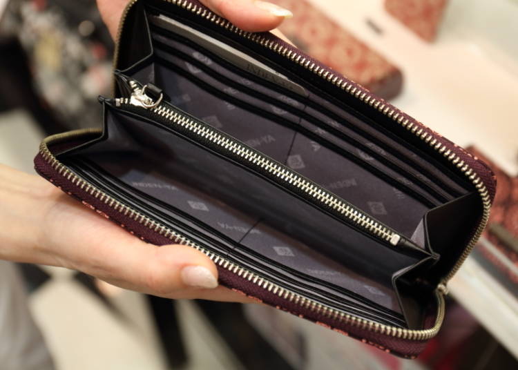 The wallet comes with a card holder and coin case, making it particularly handy.
