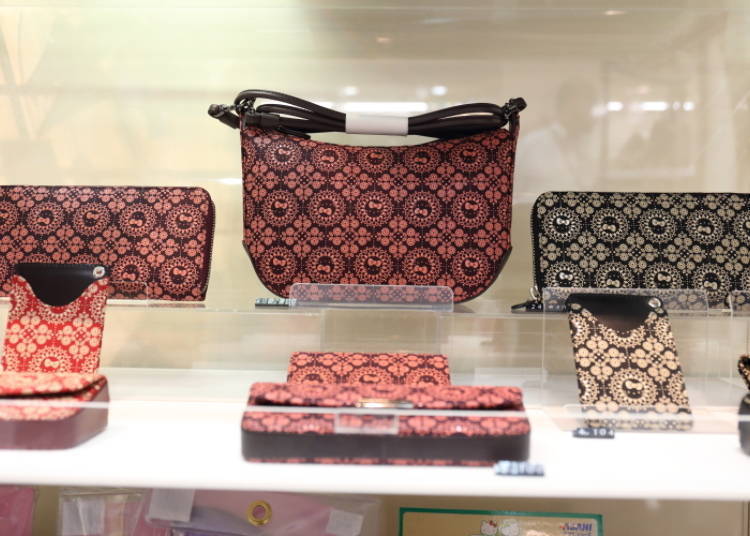 Other items from the collection, such as handbags and business card holders, are also of a fun but business-fit design.