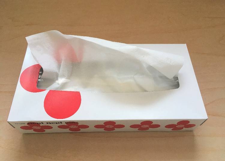 The tissue box and its ingenious bottom holes