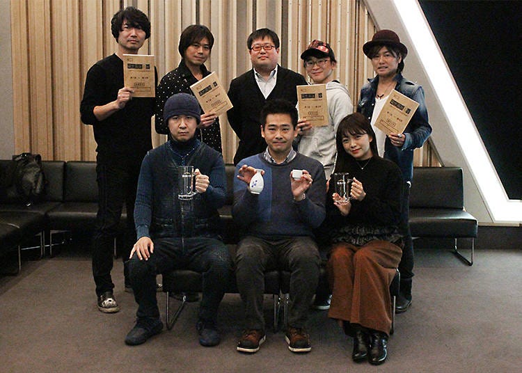 Bottom row (left to right): Tomokazu Sugita (Nobuyuki), Kazumi Ono (director), Suzuko Mimori (Shinobu)  Top row (left to right): Katsuyuki Konishi (Berthold), Daisuke Namikawa (Johann-Gustav), Natsuya Semikawa (author), Atsushi Abe (Hans), Shotaro Morikubo (Nikolaus)