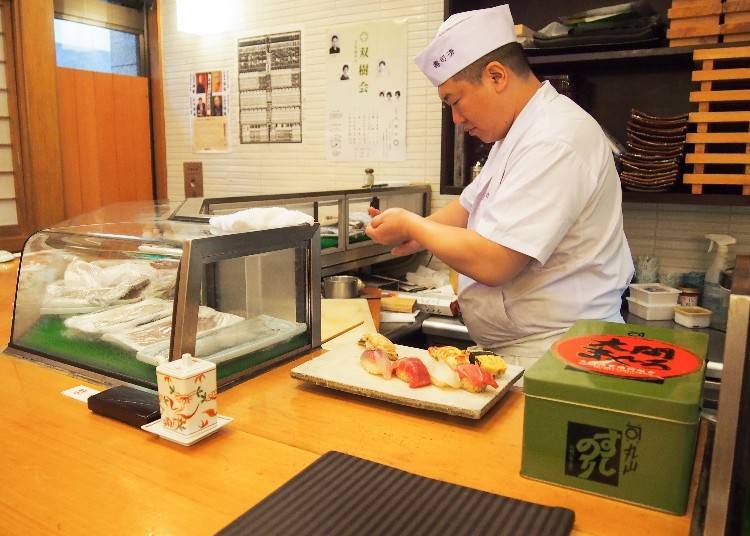 At the counter seats, the chefs prepare the sushi right in front of your eyes.