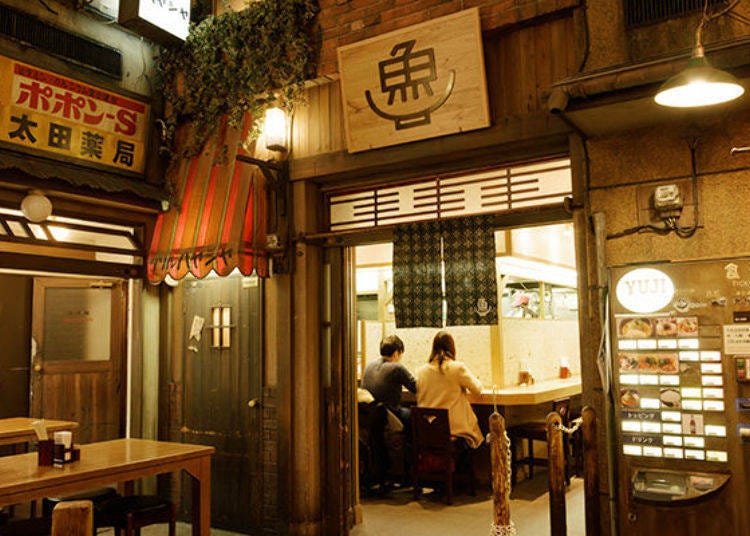 Yuji Ramen seen from the outside. Every shop at the ramen museum uses tickets bought at vending machines for their orders.