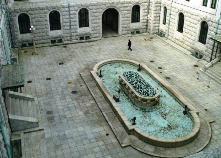 The courtyard’s fountain can be seen from the hallway.