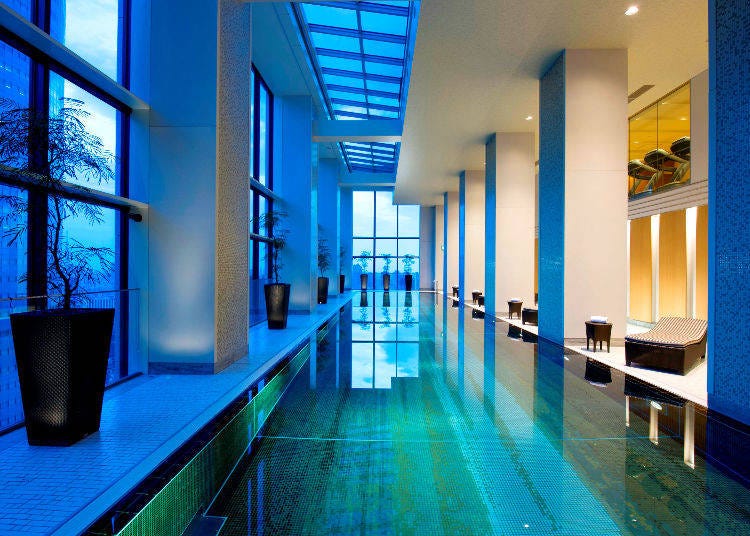 The fitness area has a 25-meter deep indoor swimming pool designed in the image of an ink painting.