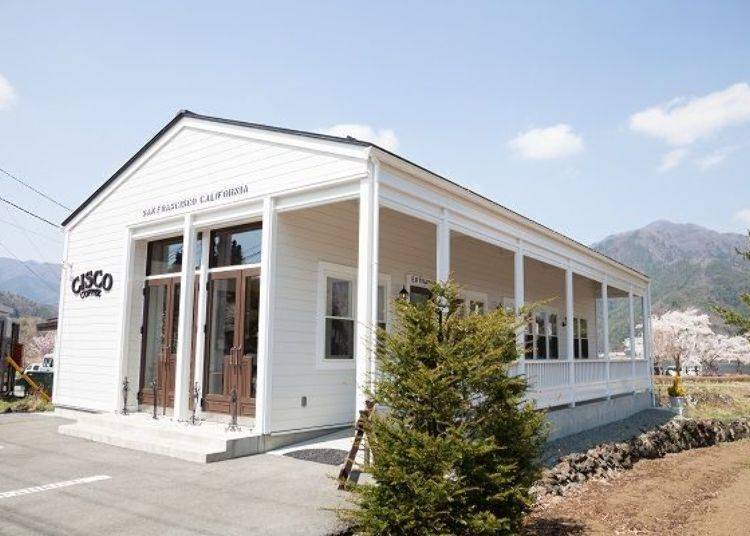 The white building stands out beautifully beneath the blue sky in a picture-perfect scene straight out of America