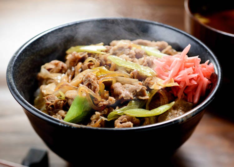 Gyudon: Savory and sweet beef strips served over a bed of steamed rice.