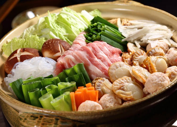 Nabe: A communal hot pot dish, brimming with meat, vegetables, and a flavorful broth.