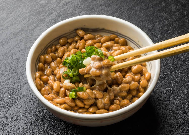 Natto: Fermented soybeans with a distinctive aroma and a sticky texture, often mixed with rice.