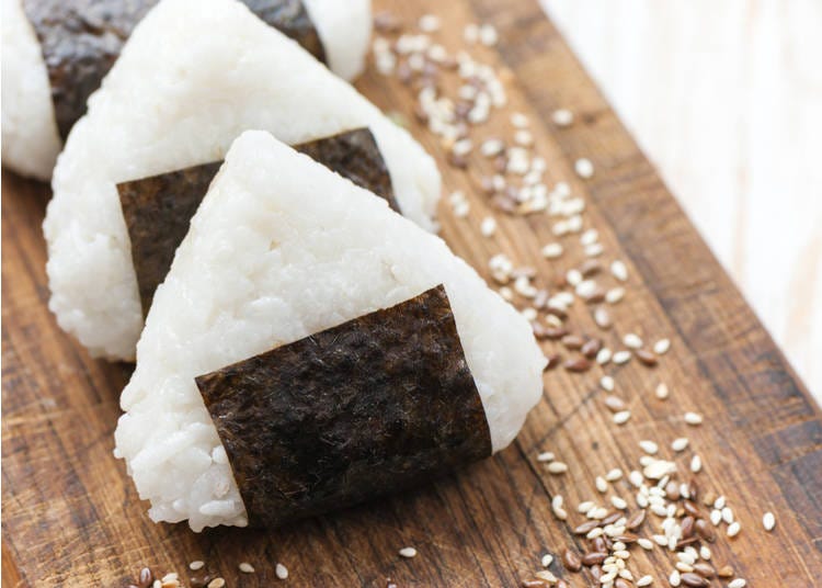 Onigiri: Hand-formed rice balls, often filled with pickled plum, salmon, or other fillings.