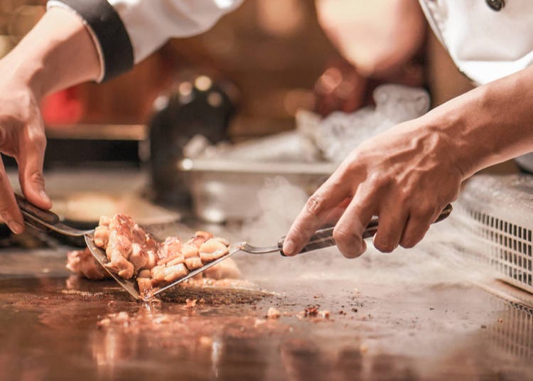 Teppanyaki: Ingredients grilled on a hot iron plate, offering a theatrical dining experience.