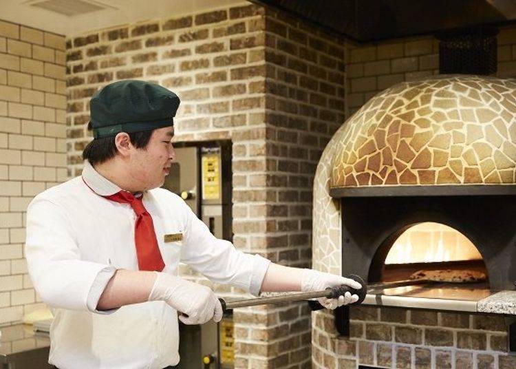 The pizza is baked in a proper stone oven at 400 degrees Celsius, making it wonderfully light and crispy.