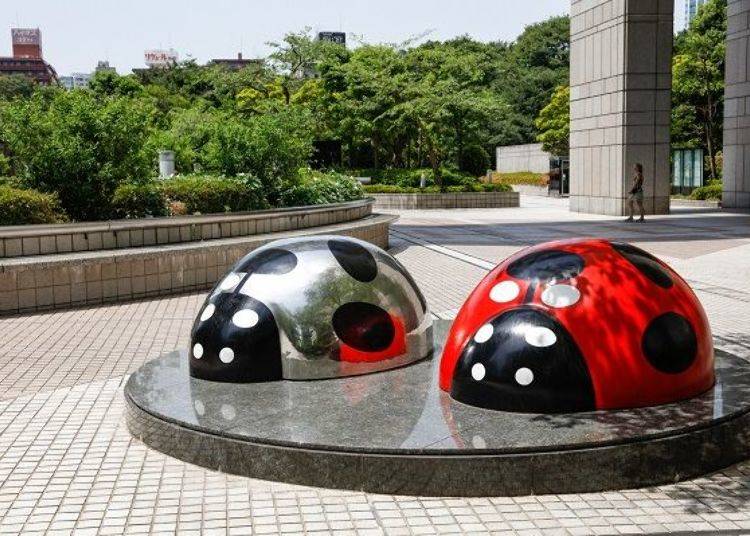 These are the two adorable “Tento Mushi” ladybugs created by Nobuo Miyamoto. Find them around the buildings!