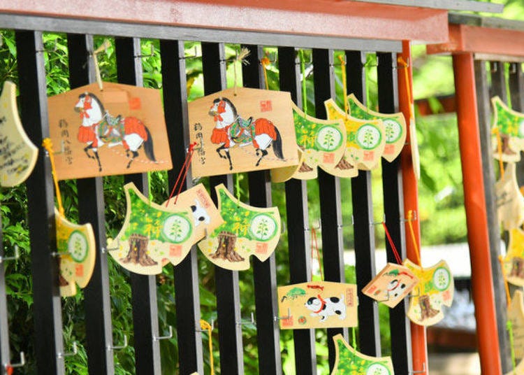 Various different wishing plaques called “ema.” The plaques shaped like a ginkgo leaf (1,000) are a homage to the Great Ginkgo and sway beautifully in the wind.