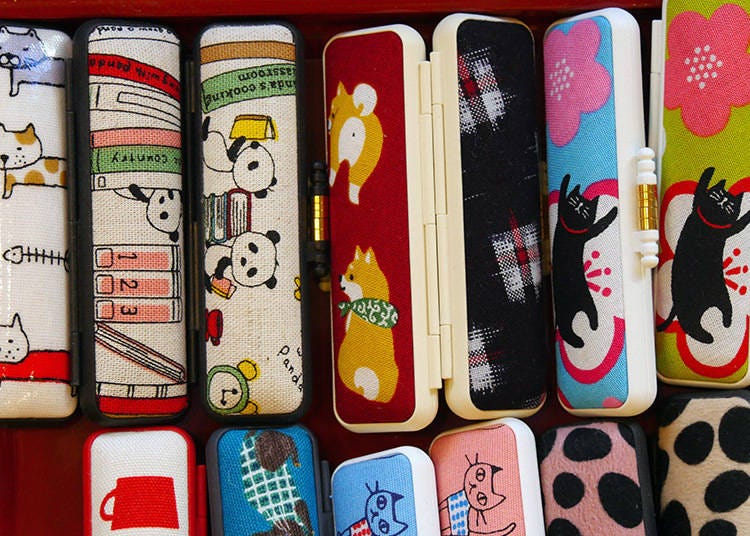 Different styles of hanko cases