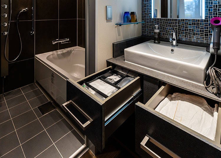 The expansive and fully equipped bathroom and dressing area