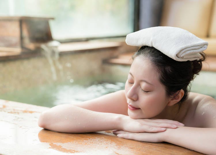 20. Dipping towels into the hot spring water