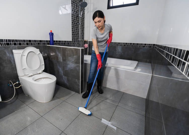 6. Cleaning Staff in the Bathroom