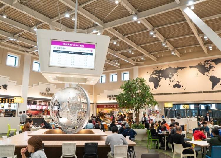 The food court is equipped with monitors that display flight information