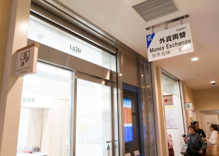 Foreign currency exchange in front of the tax exemption counter
