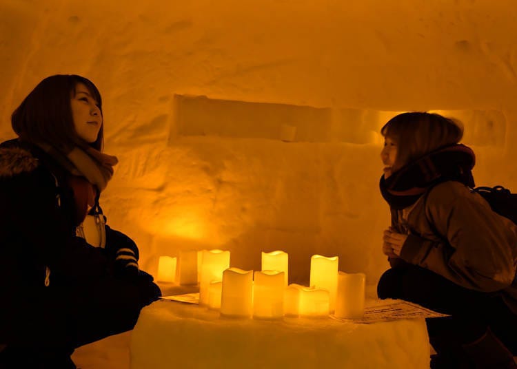 Immersing yourself in the magical atmosphere of a snow hut will surely create wonderful memories.