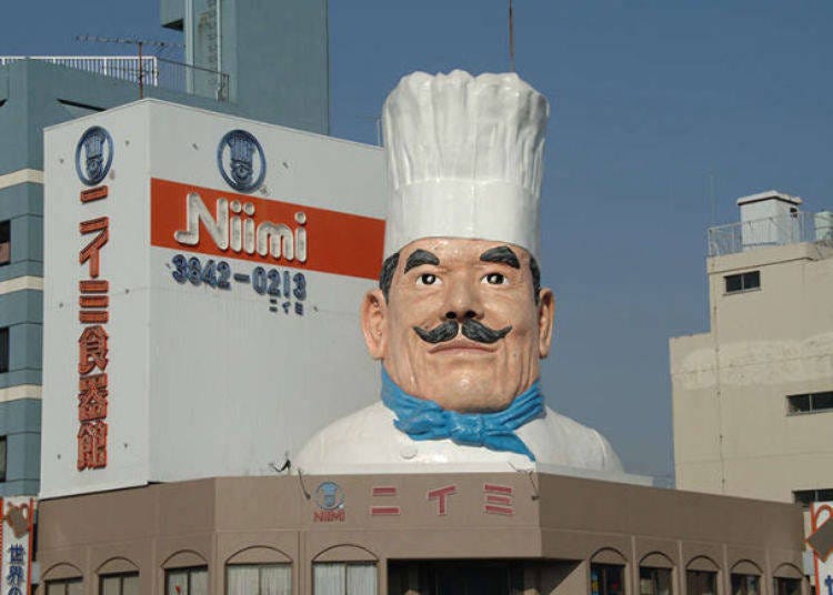 5. Hop in the kitchen goods store with a giant statue of a cook as the landmark