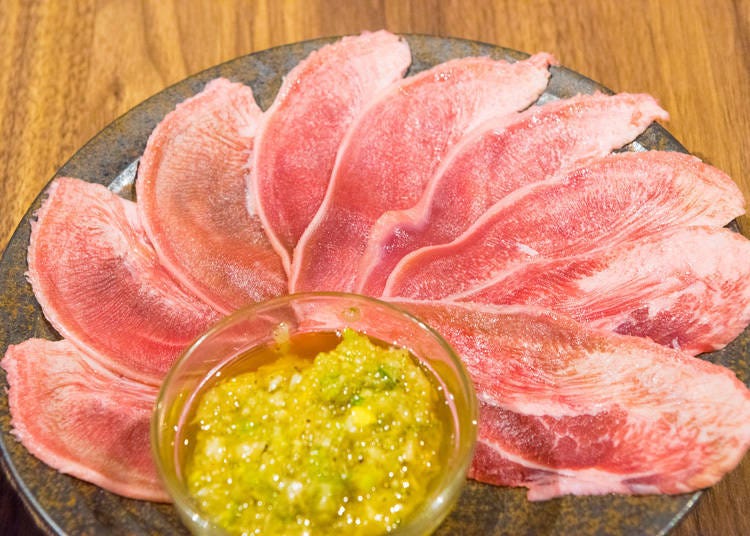 Negi and tongue with salt. Light pink tongue is cut into 1 mm thickness. It looks like a large flower. It's superb when wrapped around a dab of the "negi tare sauce", which itself is scented with sesame oil. A marvelous combination!