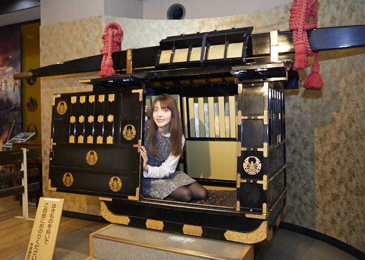 Riding in a palanquin