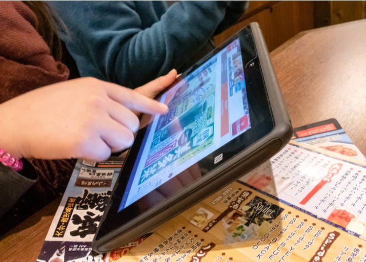 Automatic ordering at an izakaya (Images By Kenny / Shutterstock.com)