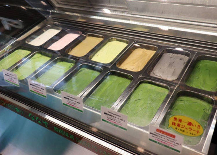 Many kinds of amazing ice-cream lined up in the display showcase