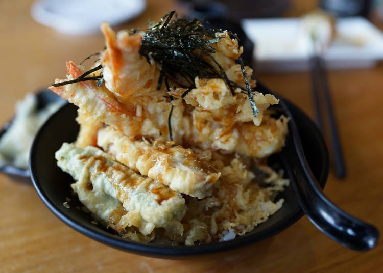 Tendon is crunchy and salty seafood tempura served on rice.