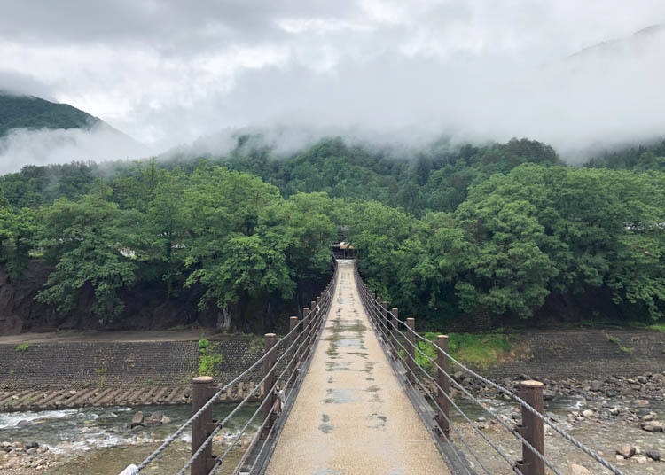 Crossing the Sho River that Flows Through Shirakawa on Deai Bridge