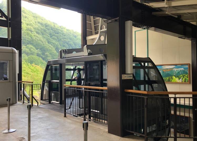 The two-tiered platform to board the double-decker gondola