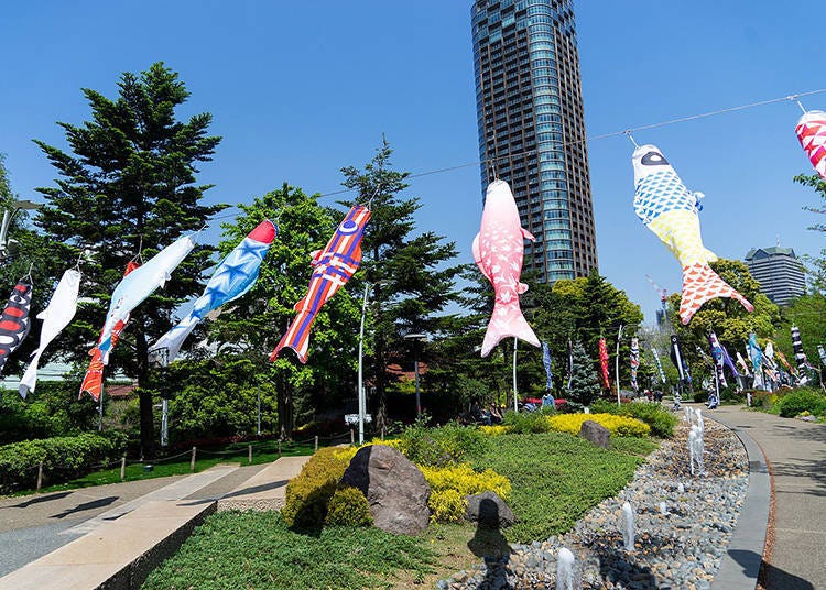 110 koinobori fluttering against the winds of a verdant spring. *This is a photo of a past event.