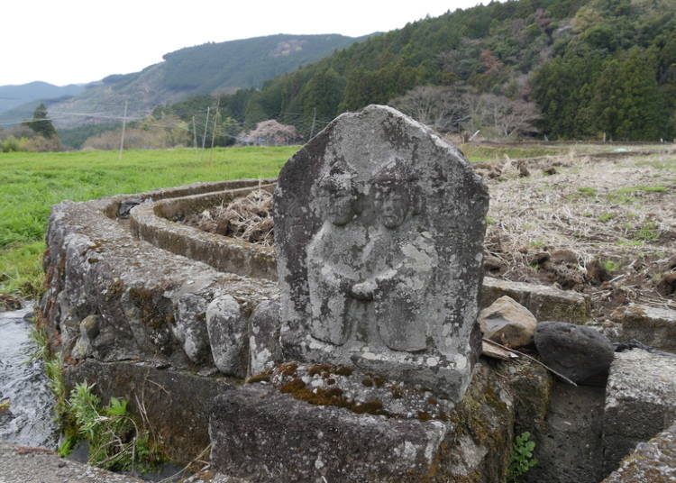 The countryside roads have many dōsojin, or roadside gods, like this. The villagers built these as protection against evil spirits, plagues, and other disasters.