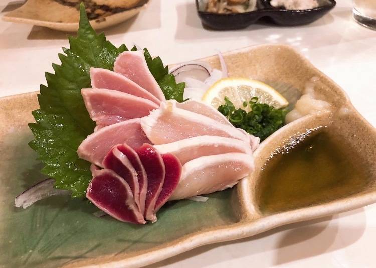 Try Kagoshima-style torisashi, if you're comfortable eating raw chicken